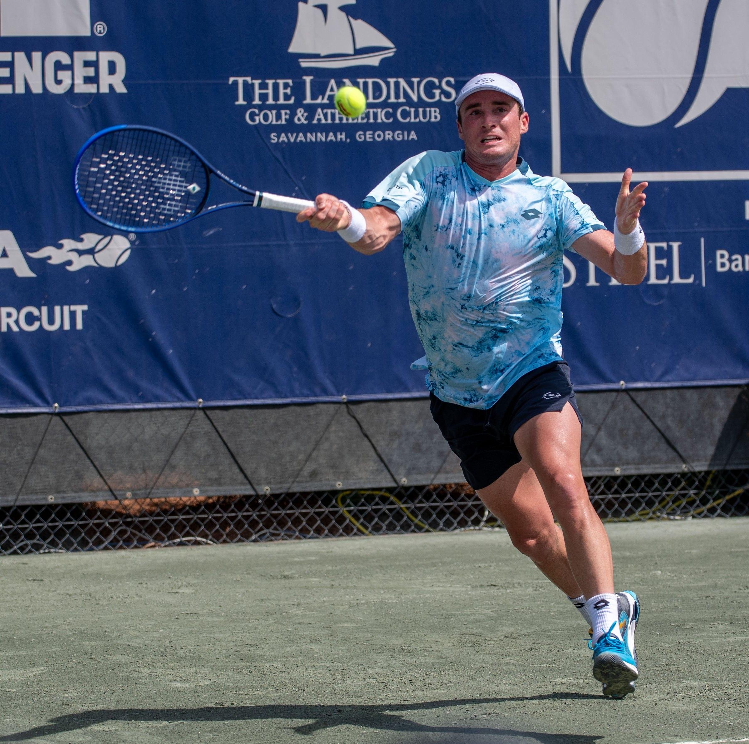 Oliver Crawford hitting a forehand at a Challenger event